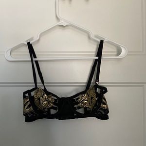 VS black and gold bra.